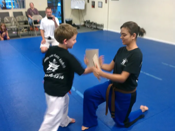 Kids practicing karate techniques